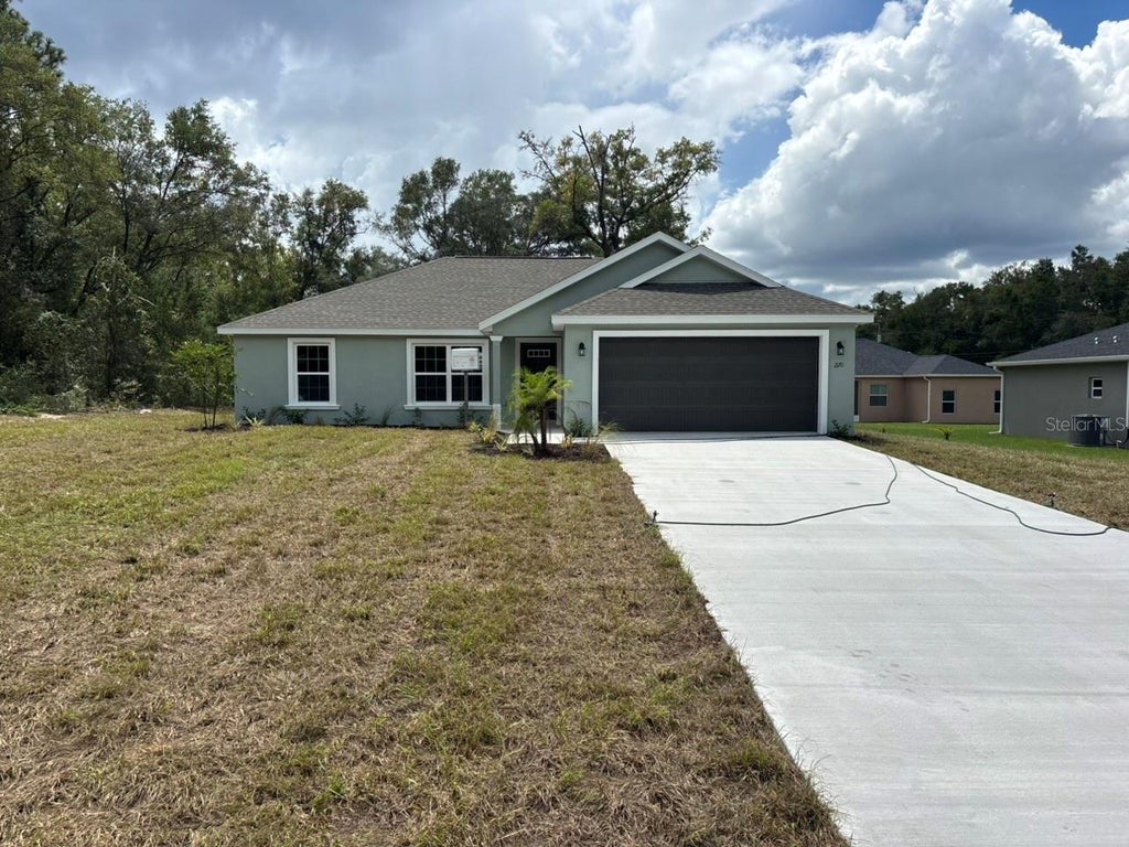 Photo of 2170 W G Martinelli Boulevard, Dunnellon, FL 34434 (MLS # G5117351)