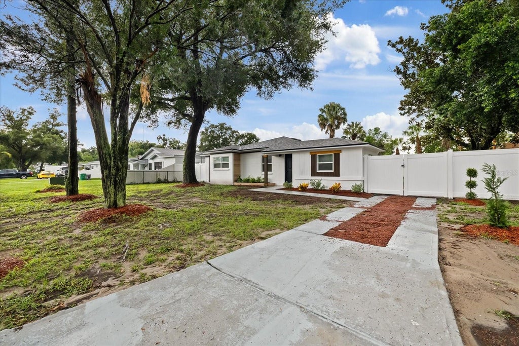 Photo of 8730 N Calder Place, Tampa, FL 33604 (MLS # TB8537428)