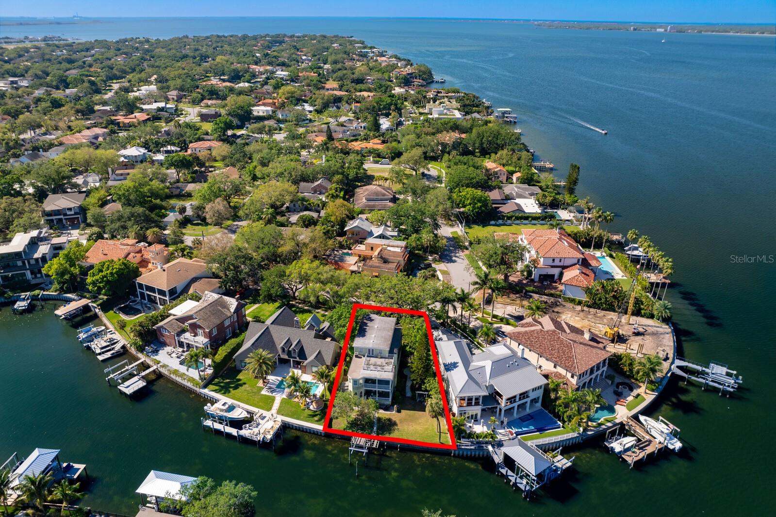 RARELY AVAILABLE waterfront property on Davis Islands, one of South Tampa’s most desired neighborhoods. Build your dream home on approximately .26 Acres and 90 feet of seawall just one home to the open bay with direct water access. The canal location will allow for breathtaking views of the bay from all levels, and of downtown Tampa from the upper levels or future rooftop deck. Located in an area of high value homes. The envied Davis Islands lifestyle provides a vast array of recreation both on and off the water. Residents enjoy a yacht club, private airport, tennis complex, community pools, Davis Islands Beach, parks and more. Offering A-rated schools and convenience to endless recreation, Water Street and Riverwalk, sports venues, shopping, dining and entertainment, come home to Luxury and the epitome of exceptional Waterfront Living in the heart of South Tampa. The value is primarily in the land and is one of the only available waterfront homesites on the market on the Island.