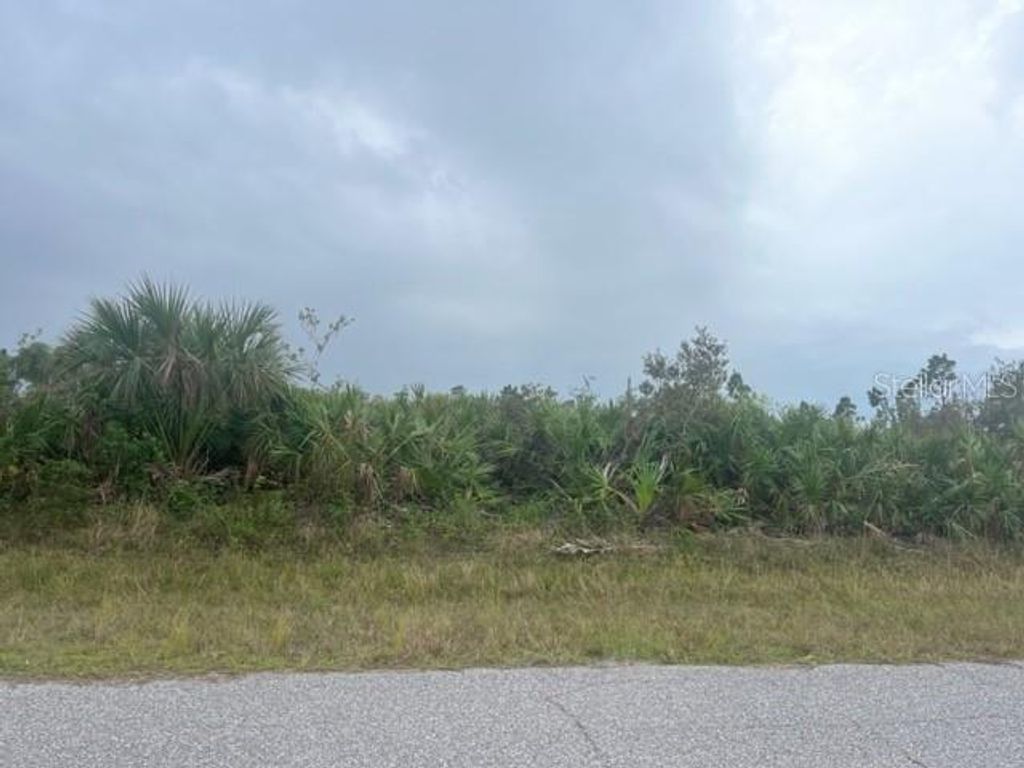 Photo of 12077 Beiman Avenue, Port Charlotte, FL 33981 (MLS # C7514544)
