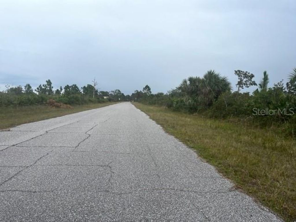 Photo of 12077 Beiman Avenue, Port Charlotte, FL 33981 (MLS # C7514544)