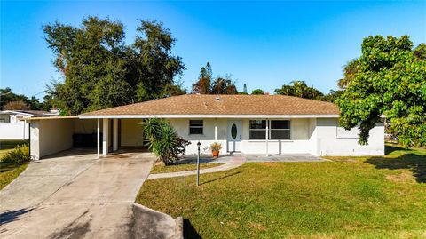 Photo of 6010 Nutmeg Avenue, Sarasota, FL 34231 (MLS # A4672372)