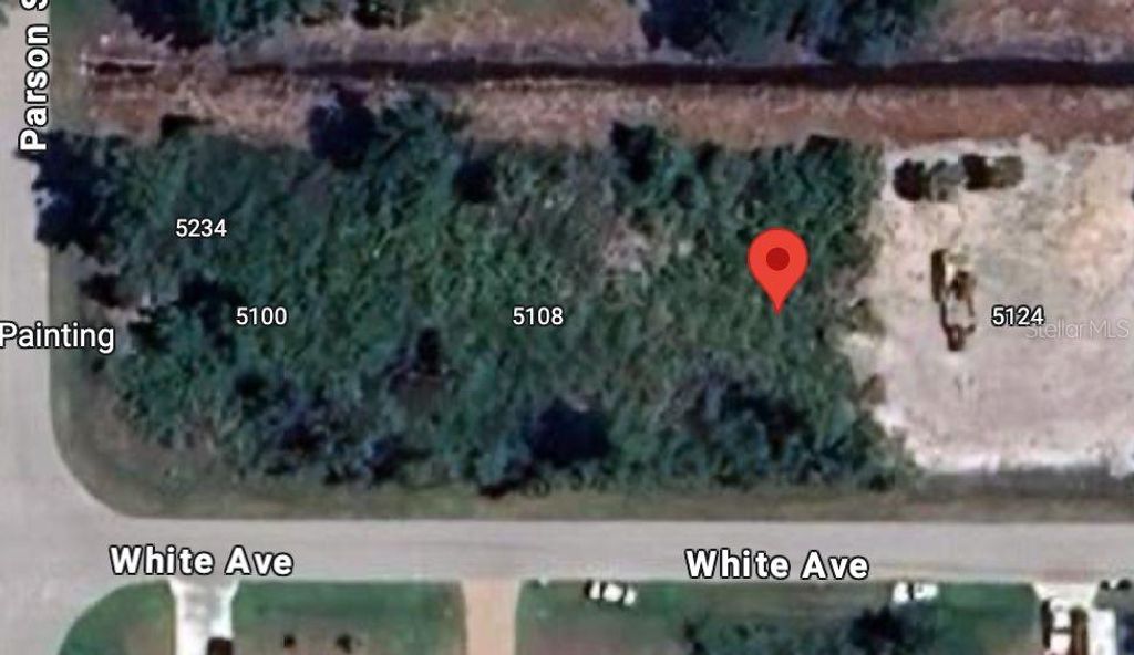Photo of 5116 White Avenue, Port Charlotte, FL 33981 (MLS # O6355802)