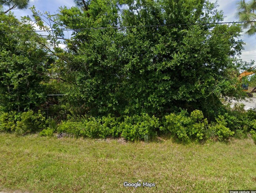 Photo of 5116 White Avenue, Port Charlotte, FL 33981 (MLS # O6355802)