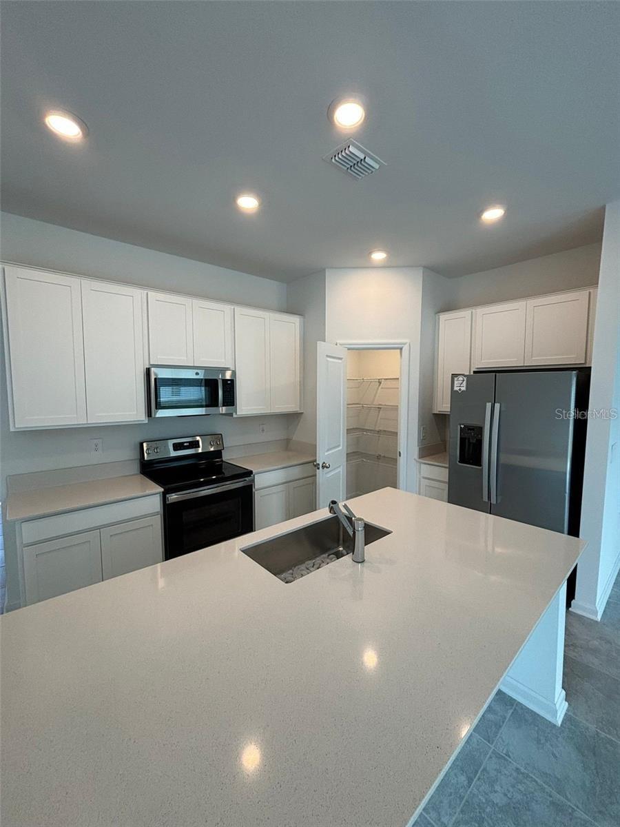 Photo of 828 Daring Drive, Davenport, FL 33837 (MLS # S5156869)