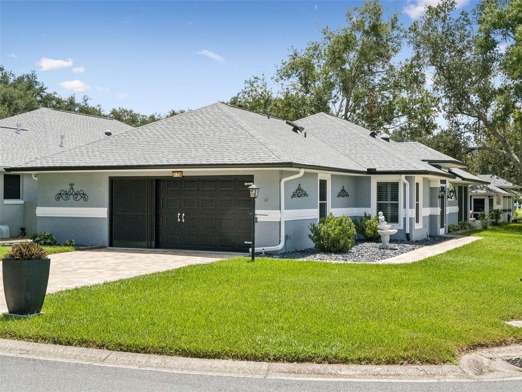 Photo of 21738 King Richards Way, Leesburg, FL 34748 (MLS # G5116067)
