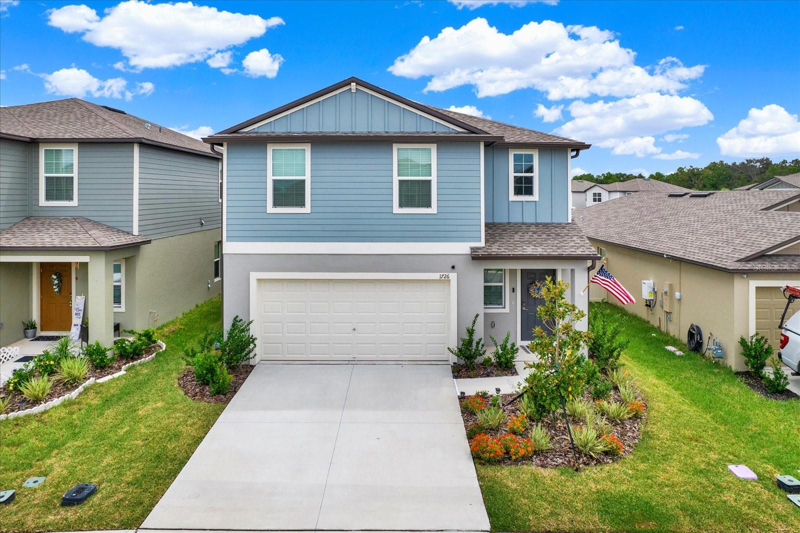 This spacious two-story home offers a contemporary open floor plan, with high ceilings & ample natural light. The spacious kitchen is perfect for entertaining with a gas stove, large island, and access to the dining & living room. Upstairs, you’ll find a versatile loft that can serve as a media room, playroom, or office, along with all four bedrooms and a full laundry room. The expansive owner’s suite features a spa-like private bathroom, dual sinks & a walk-in closet for the ultimate retreat. Additional upgrades include a fully fenced backyard with new vinyl fencing, gas appliances, and a tankless water heater for efficiency and convenience. Located in the sought-after Two Rivers community in Zephyrhills, residents enjoy access to family-friendly amenities, including a pool, playground, and scenic walking trails. Just minutes away, you’ll find premier shopping at Tampa Premium Outlets and the Shops at Wiregrass, entertainment at KRATE, and a wide variety of dining options.