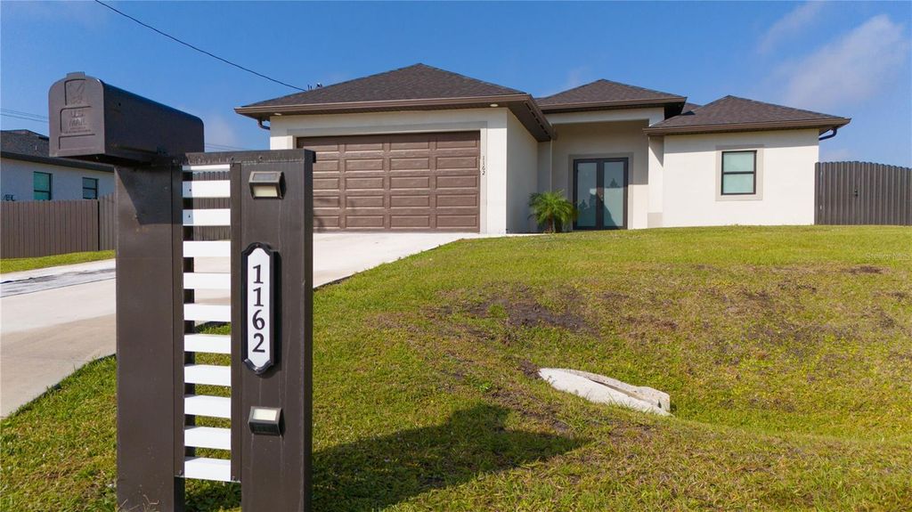 Photo of 1162 Helen Avenue S, Lehigh Acres, FL 33974 (MLS # C7507350)