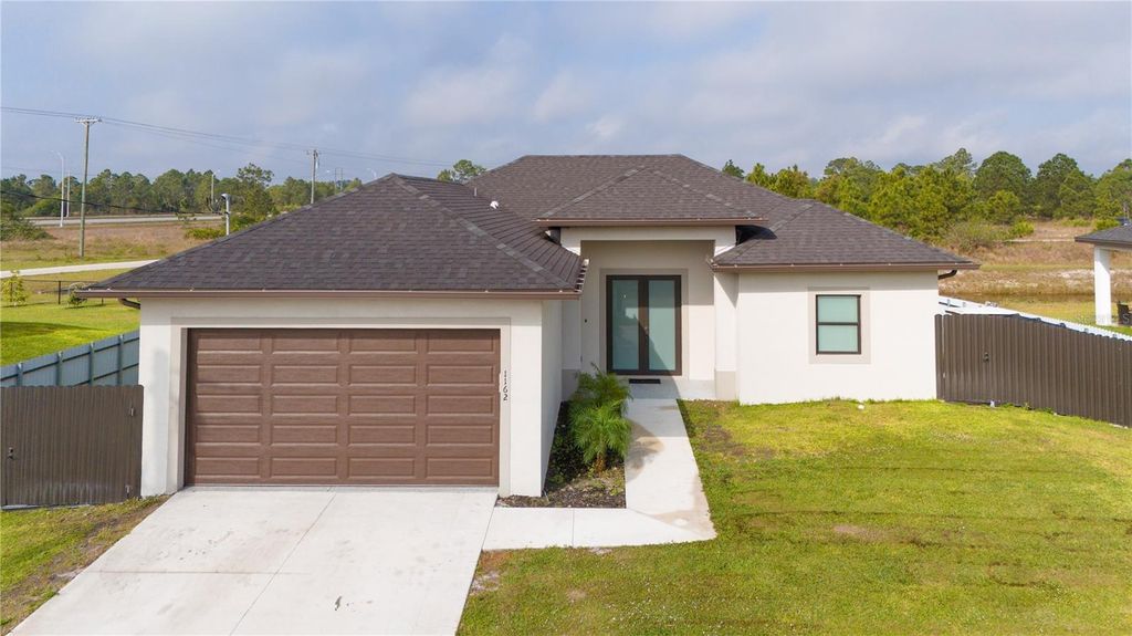 Photo of 1162 Helen Avenue S, Lehigh Acres, FL 33974 (MLS # C7507350)