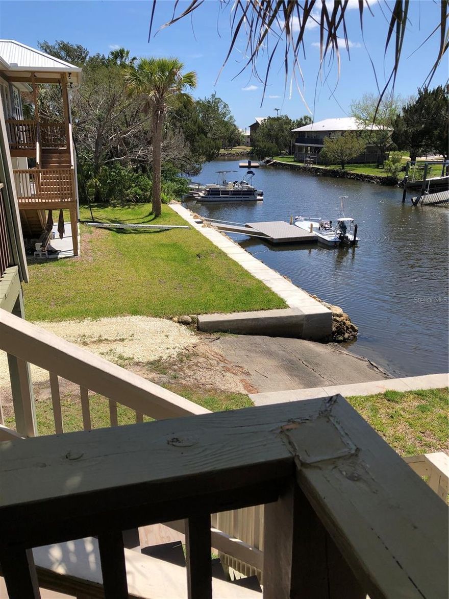 WATERFRONT STILT HOUSE, LAUNCH BOATS FROM YOUR ON PROPERTY PRIVATE RAMP; AMPLE PARKING FOR BOATS AND VEHICLES; GO AROUND THE CORNER T0 FISHING GROUNDS SEEN ON POPULAR FISHING SHOWS; FISH HE SALT RIVER, CRYSTAL RIVER, OZELLO AND ST. MARTINS KEYS; ENJOY FLORIDA'S NATURE COAST, WILDLIFE PRESERVES, ETC.  A CITRUS COUNTY PARK WITH BOAT LAUNCH FACILITIES IS ACROSS FORT ISLAND TR. , ALSO A FULL SERVICE MARINA WITH SHIP'S STORE & STORAGE.  FT ISLAND GULF BEACH IS APPRX 4 MILES WEST OF PROPERTY.  RECENT UPDATES INCLUDE ROOF, AIR CONDITIONING, HOT WATER HEATER AND BATHROOM REMODLE.  NO FLOOD DAMAGE.