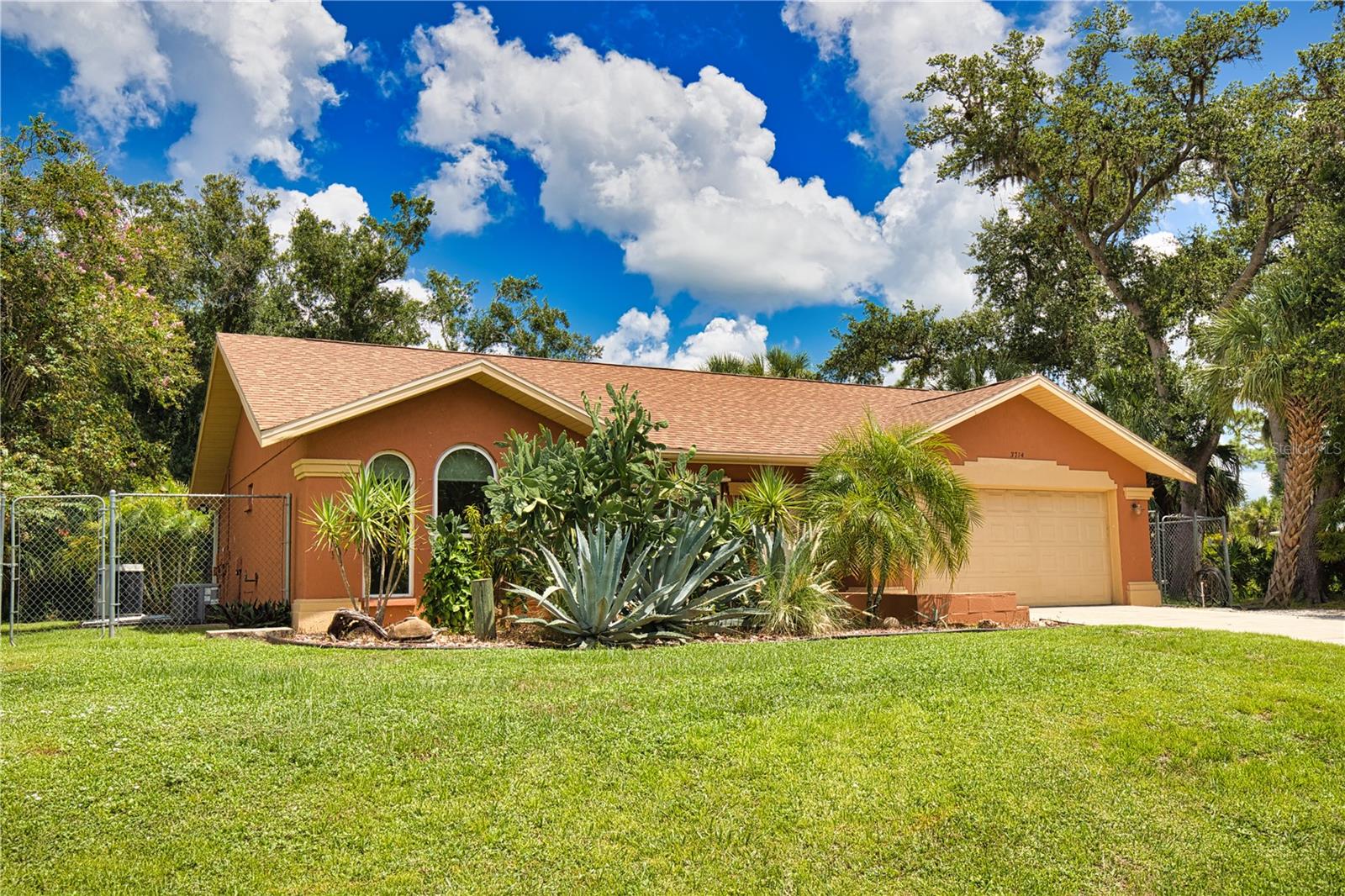 Charming Pool Home on Nearly Half an Acre in the Heart of North Port! Welcome to this beautifully updated 3-bedroom, 2-bathroom home with a 2-car garage, perfectly situated on a rare double lot—nearly ½ acre of space with no HOA or CDD fees, and not in a flood zone! Step inside to find a spacious, open layout featuring a large kitchen with stainless steel appliances and a picture-perfect window over the sink offering views of your sparkling screened-in pool. The split floor plan provides privacy, with a generously sized primary suite complete with a walk-in closet. Enjoy outdoor living year-round in the oversized screened lanai, recently refreshed with brand-new pool decking—ideal for entertaining or relaxing in your private backyard oasis. Located just minutes from Wellen Park, Cool Today Park, and Warm Mineral Springs, with easy access to I-75, US-41, shopping, dining, and major airports. Don’t miss your chance to own this North Port gem—schedule your private showing today!