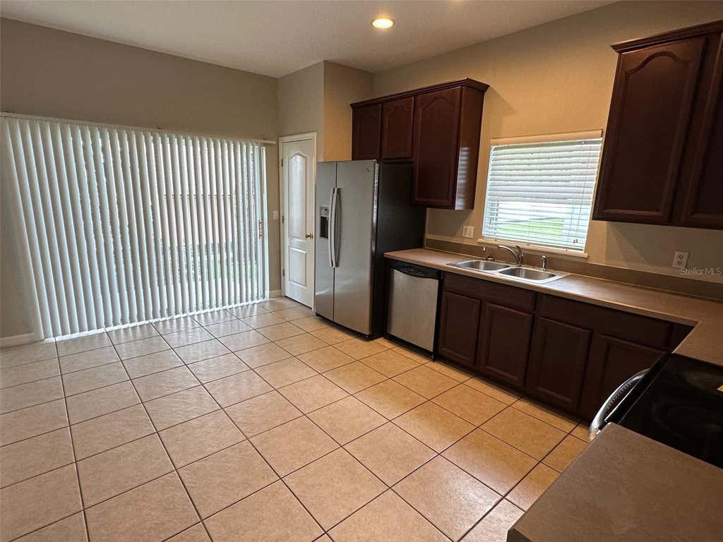 Photo of 7815 Rex Hill Trail, Orlando, FL 32818 (MLS # O6434563)