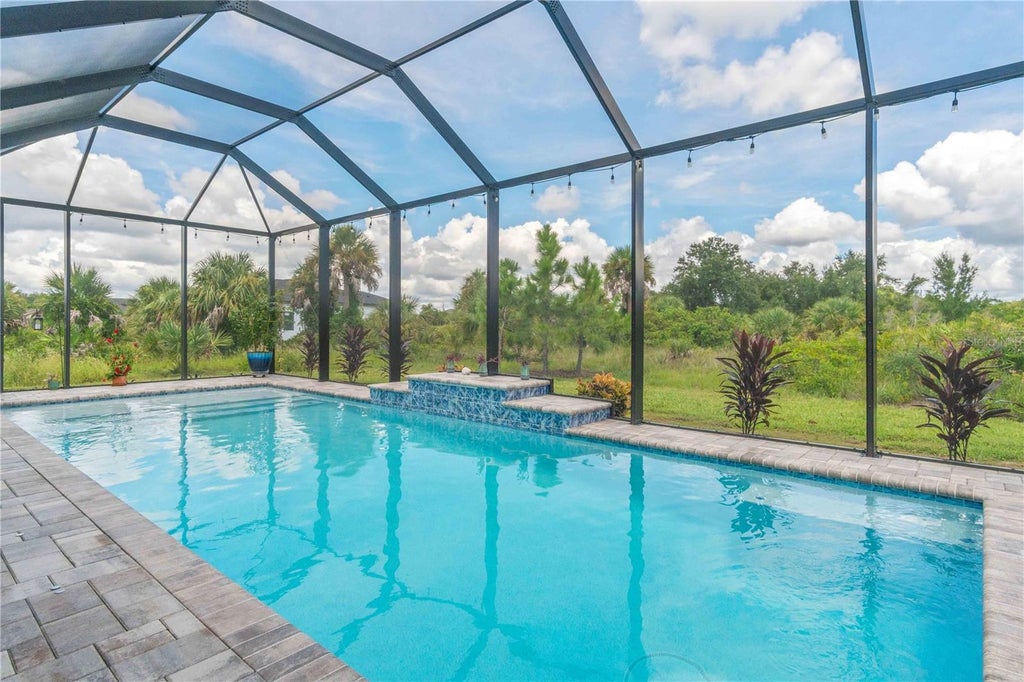 Photo of 13316 Journal Lane, Port Charlotte, FL 33981 (MLS # C7530428)