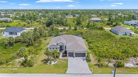 Photo of 13316 Journal Lane, Port Charlotte, FL 33981 (MLS # C7530428)