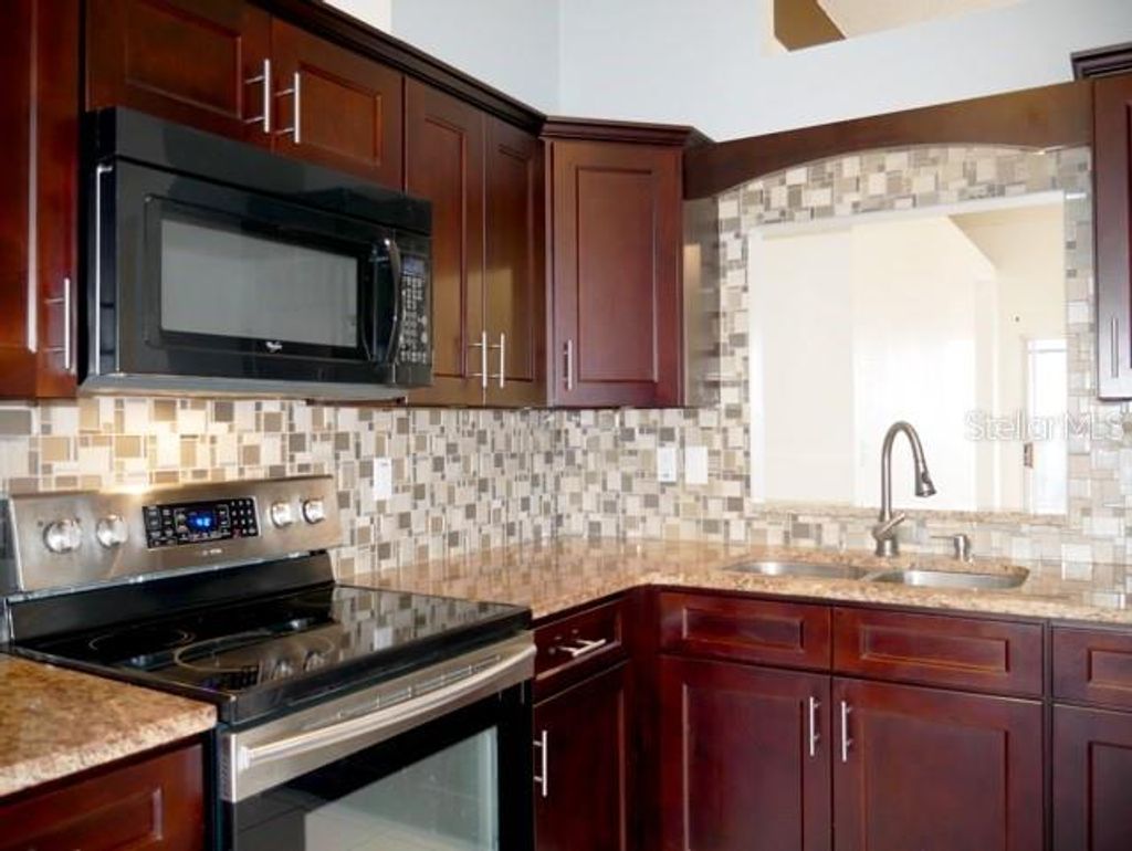 Photo of 4611 Bridgeton Lane, Orlando, FL 32817 (MLS # O6395346)