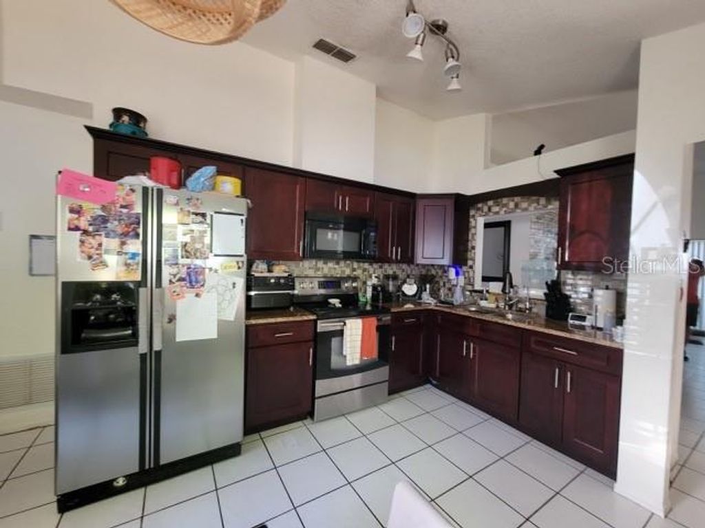 Photo of 4611 Bridgeton Lane, Orlando, FL 32817 (MLS # O6395346)