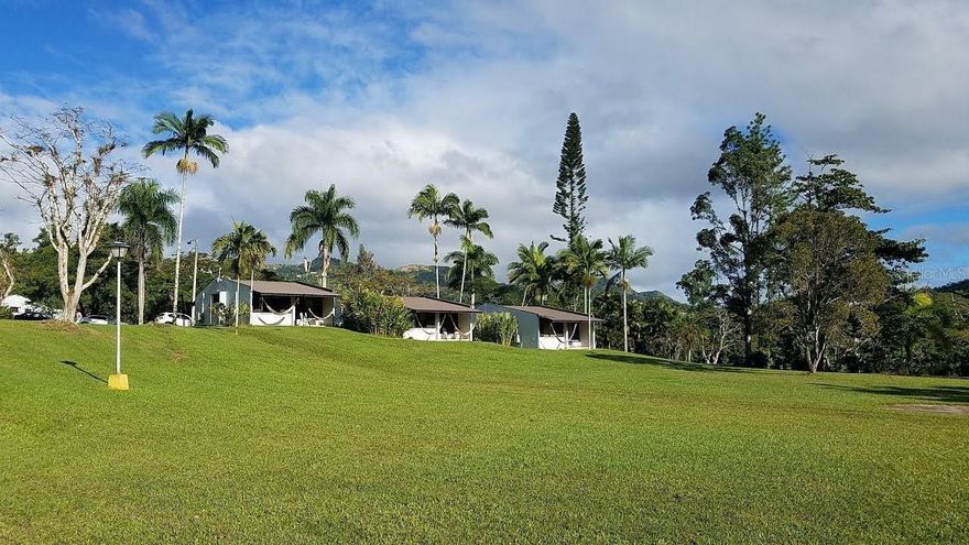 Embrace Tranquility and Opportunity at Parador Villas Sotomayor, Adjuntas

Discover the allure of Villa Sotomayor Lodge, a celebrated eco-retreat nestled in the heart of Puerto Rico's majestic mountains in Adjuntas. This unique property spans 13 lush acres, offering a blend of serenity, culture, and nature.

Features at a Glance:

Accommodations: 35 enchanting cabins provide a cozy, intimate getaway amidst natural splendor.
Fitness: Gym ensures guests maintain wellness routines in a motivating environment.
Dining: Two distinguished restaurants boast 20 years of exceptional service.
Recreation: A vast, picturesque pool area invites relaxation and leisure, set against the stunning mountainous landscape.
Equestrian Facilities: Equestrian enthusiasts will revel in the extensive land, complete with horse stables.

Adjuntas, a treasure in the mountains, is renowned for its peaceful ambiance, cultural richness, and the iconic "Sleeping Giant" view. Villa Sotomayor Lodge isn't just a property; it's a lifestyle—a sanctuary for those seeking a tranquil retreat or the excitement of eco-tourism adventures.

For the visionary buyer or investor: This is more than a purchase; it’s an invitation to continue a legacy of hospitality and a promise of a lifestyle in harmony with nature.

Begin your adventure in Puerto Rico with this unparalleled property offering. A haven for relaxation and a prime opportunity for business awaits.