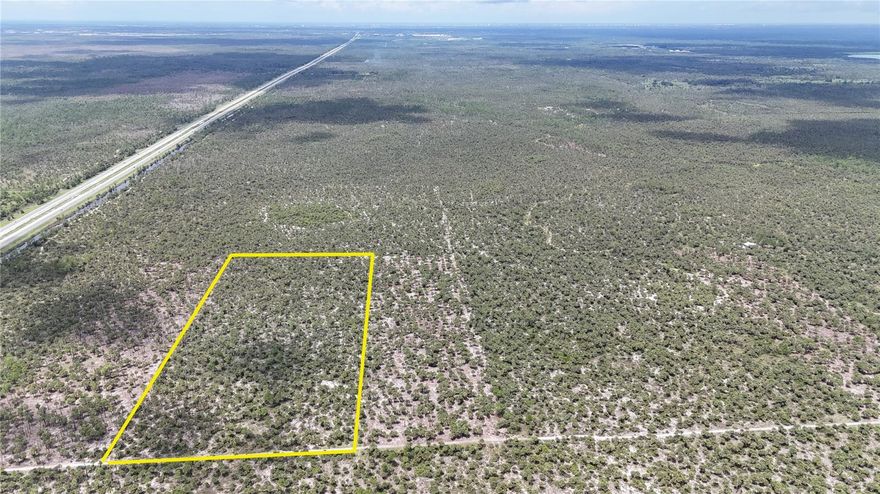 Located in rural Collier County, Florida, this 5-acre off-grid tract offers a recreational opportunity with natural Florida habitat and privacy. This secluded parcel is accessed via Benton Road, where a gate with a code provides added security. A four-wheel drive vehicle is required to reach the property due to unimproved roads and terrain conditions.

The property is characterized by native vegetation, including a mix of cabbage palms and mature pine trees. The area shows significant signs of whitetail deer activity, indicating potential for recreational hunting or wildlife observation. The parcel is relatively flat and covered in natural Florida flora, making it well-suited for a variety of outdoor uses such as camping, hiking, or simply enjoying the outdoors.

There are no utility connections currently available, and the property is best suited for buyers seeking an off-grid, recreational-use parcel. This land could also be considered for future investment purposes. Due to its remote nature, this tract is ideal for those looking for a private getaway or a basecamp for outdoor activities.

The property lies within driving distance of several small towns and larger communities. Immokalee is approximately 20 miles to the northeast, offering basic services, supplies, and amenities. Naples is located about 40 miles to the west and provides access to major retail, healthcare, and recreational resources.

This land is part of a larger area that remains largely undeveloped, which supports a variety of wildlife and native plant species. While remote, the gated access provides a layer of privacy and security for property owners. This is a rare opportunity to own acreage in Collier County suitable for outdoor recreation or long-term land holding.

All prospective buyers are encouraged to verify zoning, land use, and access requirements with Collier County and conduct any necessary due diligence.