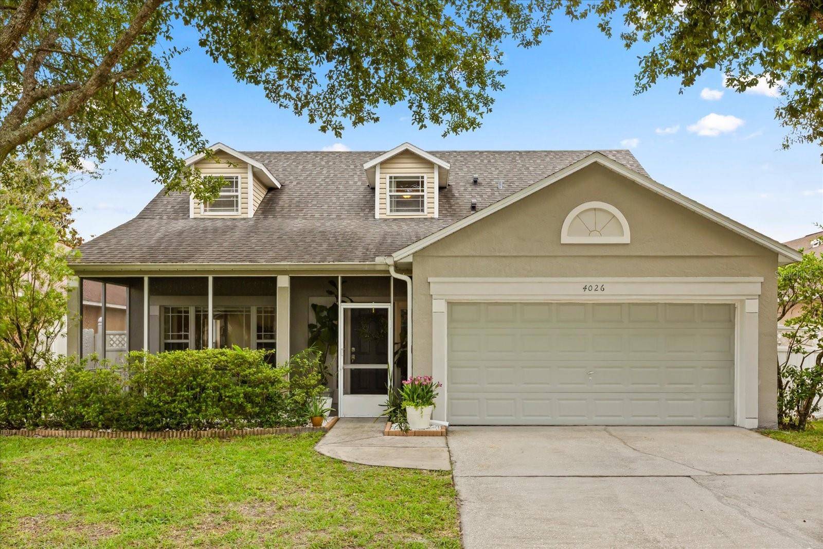Welcome to this charming and cozy home nestled in a highly desirable East Orlando location—just minutes from UCF! Bursting with natural light and character, this 4-bedroom, 2.5-bathroom residence offers a thoughtful layout with the primary bedroom conveniently located on the first floor. Oversized windows throughout flood the home with natural light, creating a warm and inviting atmosphere. ***Recent updates include a 2018 roof, brand new 2025 AC, and CPVC plumbing for added peace of mind.*** The home boasts both a screened-in front porch and rear patio, perfect for relaxing or entertaining outdoors. Enjoy a fenced-in yard with plenty of space for play, pets, or gardening. Upstairs, you'll find three additional bedrooms, a full bathroom, and a versatile loft—ideal as a home office, study space, or media room. A convenient half bath is located downstairs for guests. Located in a community that offers fantastic amenities including a pool, tennis court, and clubhouse, this home combines comfort, functionality, and location all in one. Schedule a showing today!