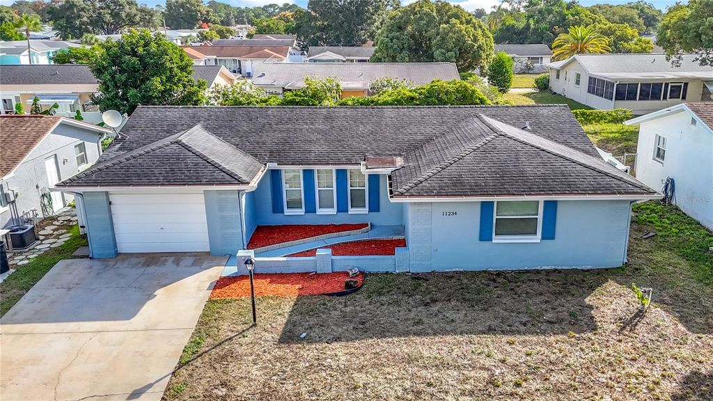 Photo of 11234 Yewtree Avenue, Port Richey, FL 34668 (MLS # C7516950)