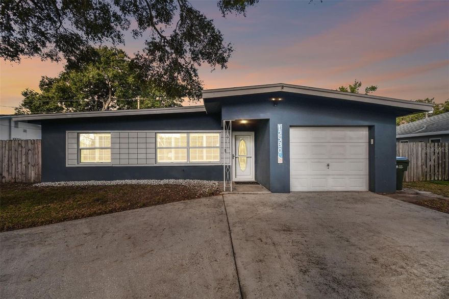 Welcome to 12530 136th Ln, an impeccably updated 3 bedroom, 2 bath residence situated in one of the most desirable neighborhoods in Largo. Thoughtfully enhanced with modern upgrades and designed for effortless living, this home offers a seamless blend of style, comfort, and functionality.

Upon entry, you are greeted by an expansive open concept floor plan bathed in natural light, creating an inviting and sophisticated ambiance. The spacious living and dining areas flow effortlessly into a beautifully appointed kitchen featuring brand new appliances. This makes it perfectly suited for both everyday living and elevated entertaining.
Designed with comfort in mind, the home boasts a newly installed HVAC system complete with an advanced air scrubber, promoting superior indoor air quality while delivering energy efficient, year round climate control.
Step outside to your own private retreat, a fully fenced backyard offering tranquility, security, and ample space for outdoor gatherings, pets, or future enhancements such as a pool or garden oasis. The property also features generous front parking and a one-car garage, providing both convenience and practicality.
Located within a highly regarded school zone, the home is zoned for the desirable Anona Elementary School, known for its strong community reputation and academic excellence. This is an added advantage for families seeking both quality education and long-term value.
Ideally situated near fine dining, shopping, parks, and the stunning Gulf Coast beaches, this exceptional residence delivers the perfect balance of luxury, privacy, and accessibility. One of the many amazing features of this home is it does not require flood insurance as it is located in flood zone X. This will bring you peace of mind during those unpleasant storms, and hurricane season.
A rare opportunity to own a move in ready home where modern upgrades meet timeless comfort.