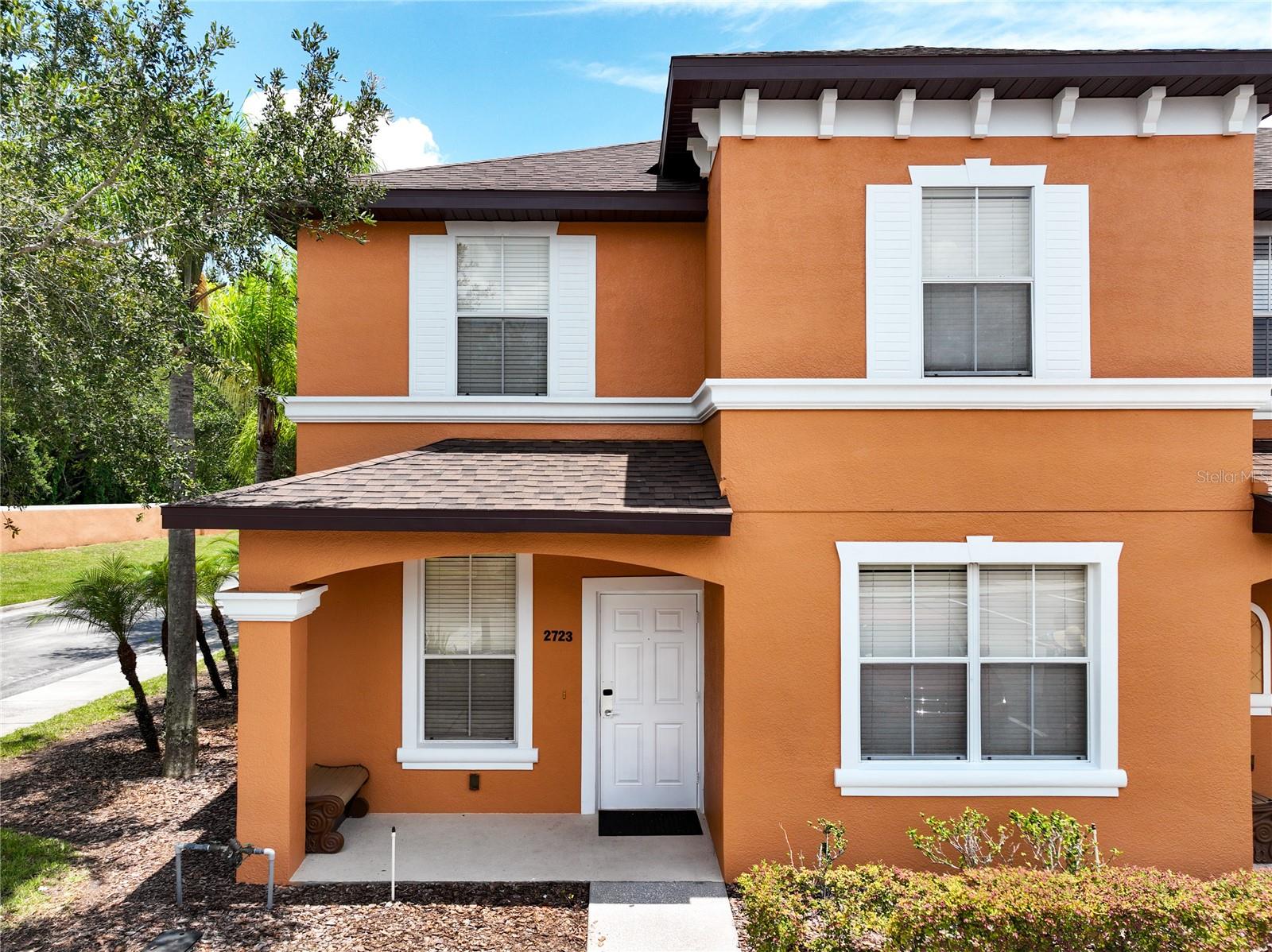 Discover your dream home in this exquisite, fully furnished townhouse located in desirable Regal Oaks at Old Town, just minutes from major theme parks, shopping restaurants, and more. The open-concept living area offers ample space for entertaining. From the living room, you can head out into a fully enclosed sunny patio with lounge chairs and a hot tub, great for outdoor relaxation any time of the year! Beautiful kitchen with wooden cabinets, stylish countertops, stainless steel appliances... Located on the first floor is a spacious and charming bedroom with a full bathroom. Upstairs is where the remainder of the bedrooms are, including the primary bedroom with another ensuite bathroom and a covered balcony also where you'll find the in-unit laundry room. Resort-style amenities include pool with water slide, hot tub, lounge, cabanas, fitness center, pool bar, restaurant, and more. Schedule your appointment today!