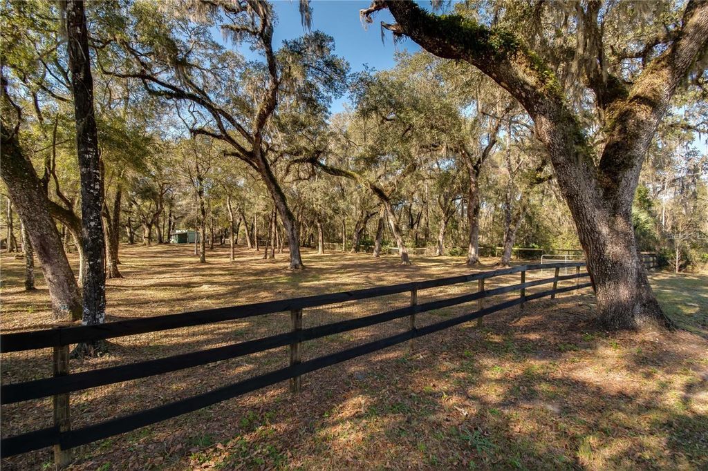 Photo of 63 Lake Wood Circle, Ocala, FL 34482 (MLS # O6392613)