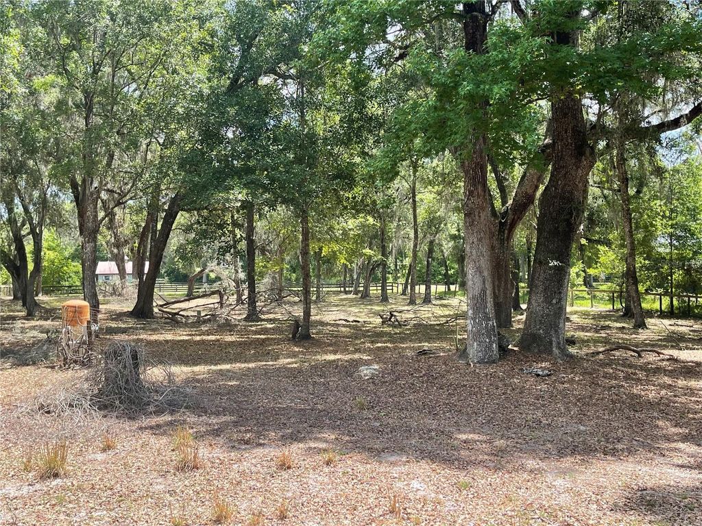 Photo of 63 Lake Wood Circle, Ocala, FL 34482 (MLS # O6392613)