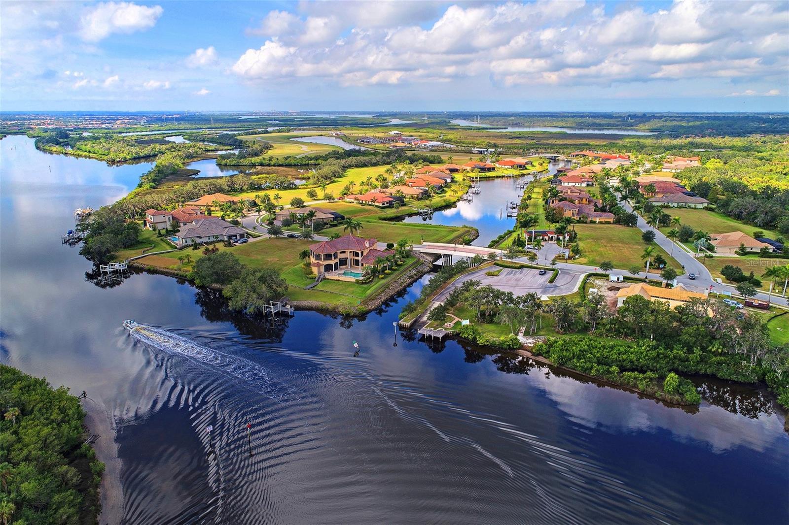 Large boating homesite with direct quick access to the Manatee River. This lot offers long views down the private harbor, located in the neighborhood of Rio Vista at the The Islands on the Manatee River. Preapproved for a boat dock and lift. This is one of the last harbor lots in the Islands the only gated boating community in the area where you can still build a new home.
Welcome to The Islands on the Manatee River, a private gated waterfront boating community nestled among world class golf courses that celebrates Florida’s natural beauty. Voted "Best Community" in the Sarasota-Bradenton Parade of Homes for the last 8 years. We’ve just released our final neighborhood of Rio Vista Estates, our highly sought after homesites directly on the Manatee River. The River Lodge clubhouse, exclusive to residents of The Islands, provides a riverfront gathering place for the enjoyment of our residents. The Islands is a place where nature’s bounty is just the beginning of the excitement that will take your breath away. Situated on 225 acres of pristine private islands, our sanctuary features up to 1.5 acre estate-sized homesites directly on the river or on picturesque harbors, all having navigable access to the tranquil waters of the Manatee River and onward to the Gulf of Mexico.