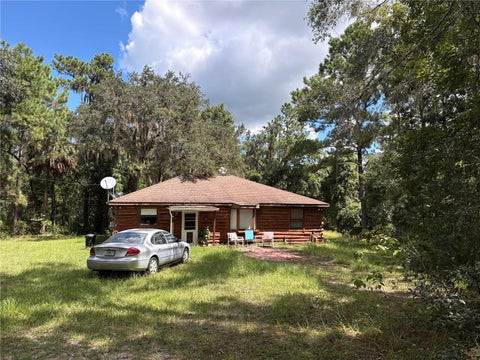 Photo of 20327 Powell Road, Brooksville, FL 34604 (MLS # W7889249)