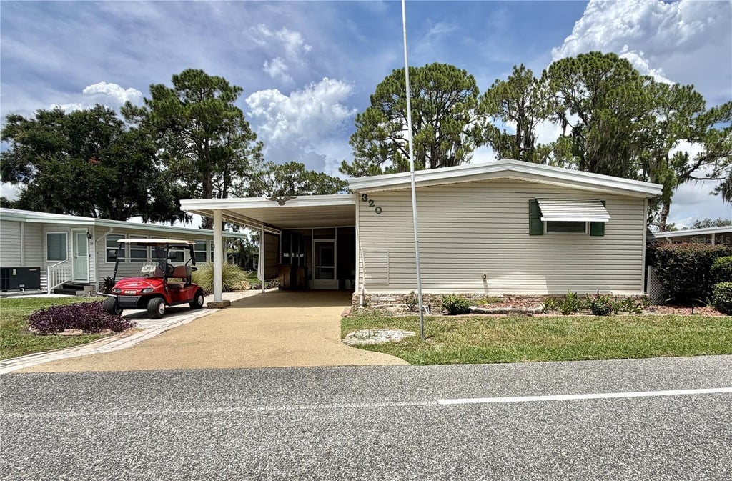 Photo of 320 Palo Verde Drive, Leesburg, FL 34748 (MLS # G5116273)