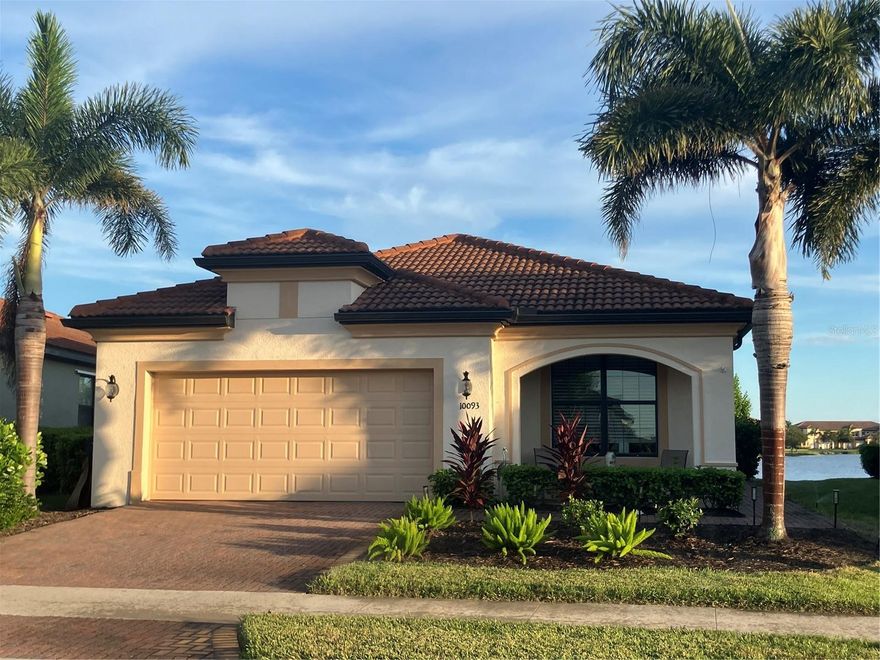 A Rare Opportunity in Sarasota National. This beautifully maintained home offers all the comfort and charm you’ve been searching for — and it’s priced to move. Comparable homes in the community are listed for much more,. Welcome to your southern exposure expansive water view home featuring upgraded appliances, stone fireplace and modern fixtures from fans to lights. Home is in pristine condition and only needs a new owner. THIS HOME WONT DISAPPOINT!