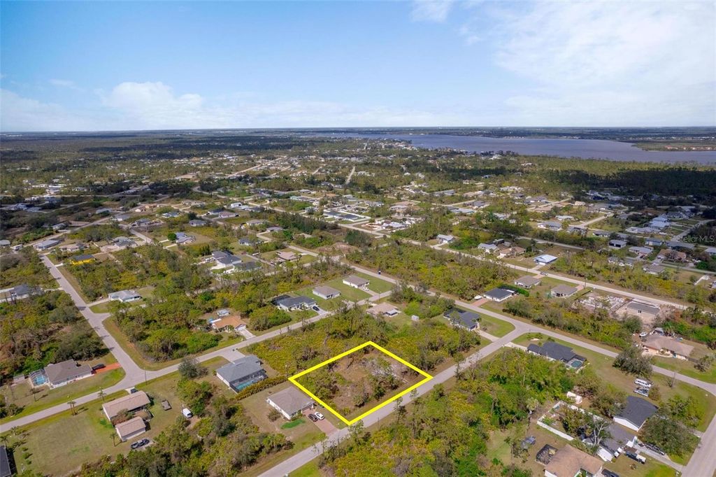 Photo of 12400 Prudential Avenue, Port Charlotte, FL 33981 (MLS # C7506017)
