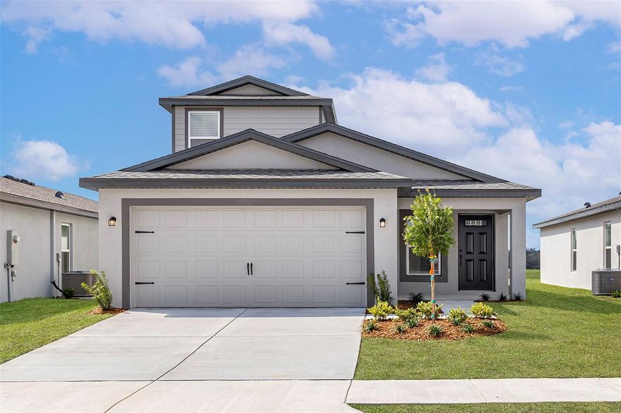 The Kissimmee floor plan by LGI Homes offers the perfect blend of space, comfort and style. Featuring 4 bedrooms, 3 bathrooms and a 2-car garage, this thoughtfully designed home provides the flexibility today’s homeowners need, whether it’s extra space for guests, a home office or a growing family. The open-concept layout creates a warm and inviting atmosphere, perfect for entertaining or enjoying everyday life.
At the center of the home is a chef-ready kitchen complete with a sprawling quartz island, stainless steel Whirlpool® appliances and plenty of counter space. Natural light fills the spacious living area, while the private owner’s retreat offers a relaxing place to unwind at the end of the day. Step outside to the backyard lanai and enjoy the best of Florida living. With LGI Homes’ CompleteHome™ package, this move-in ready home comes loaded with upgrades designed for both style and convenience.