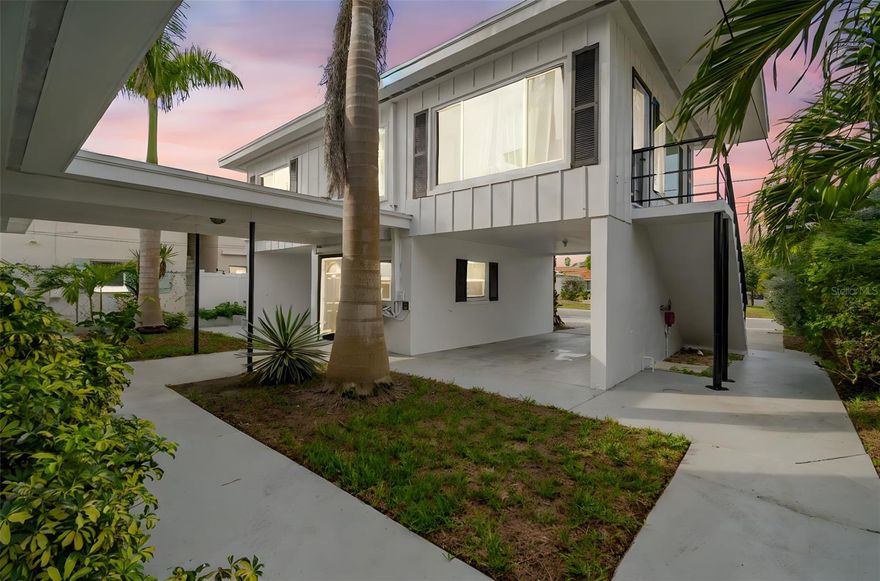 One or more photo(s) has been virtually staged. Newly renovated 2 bedroom, 2 bathroom waterfront apartment offering 1,100 square feet of bright, functional living space. Terrazzo flooring runs throughout the unit, creating a clean and cohesive feel. The updated two tone kitchen includes all appliances and butcher block countertops with ample workspace.

A full wall of sliding glass doors opens to a private terrace with unobstructed views of the Intracoastal Waterway, providing excellent natural light and a true indoor outdoor living setup. The building is located directly on the Intracoastal and is within walking distance to the beach, restaurants, and coffee shops.

Boat dockage is available for vessels up to 28 feet, subject to availability. A garage is also available. On site laundry is provided for tenant use.

The landlord pays for lawn care, pest control, and trash. Rental requirements include minimum income of two times the monthly rent.

Ideal for tenants seeking a well located waterfront apartment with convenient access to beaches and local amenities.