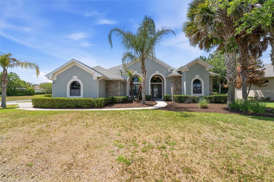 This beautifully maintained home is a rare find in a highly sought after community for under $440k. Designed with entertaining in mind, it features a spacious 23x11 screened lanai, plenty of kitchen space for guests and ample living area for relaxing.Inside, you'll love the desirable open layout with high ceilings. A formal dining area is great to eat breakfast while enjoying a beautiful Florida sunrise overlooking the water! The kitchen is thoughtfully designed with ample cabinet and counter space. The generous living and family rooms have plenty of room for different furniture arrangements.The split-bedroom floor plan offers privacy and roominess throughout the home, with a spacious primary suite featuring his-and-hers walk-in closets and a large en suit bath. Guest bedrooms are located on the other side of the house for privacy when guests are in town.Located in an award-winning 55+ community, residents enjoy an impressive array of amenities, including an 18,000 sq ft clubhouse, an Olympic sized swimming pool, hot tub, library, billiards room, card/game room, arts & crafts center, miles of interconnecting waterways, pickleball, tennis, bocce ball, walking trails, softball field, fire pits and a fenced RV/boat parking/storage area. HOA includes lawn irrigation and internet/cable, all for a low monthly fee.Conveniently located just minutes from downtown Mount Dora, with easy access to charming shops, dining, festivals and cultural attractions. Orlando's world-famous destinations and Florida's beautiful beaches are both within an hour's drive. Don't miss out on this great opportunity.