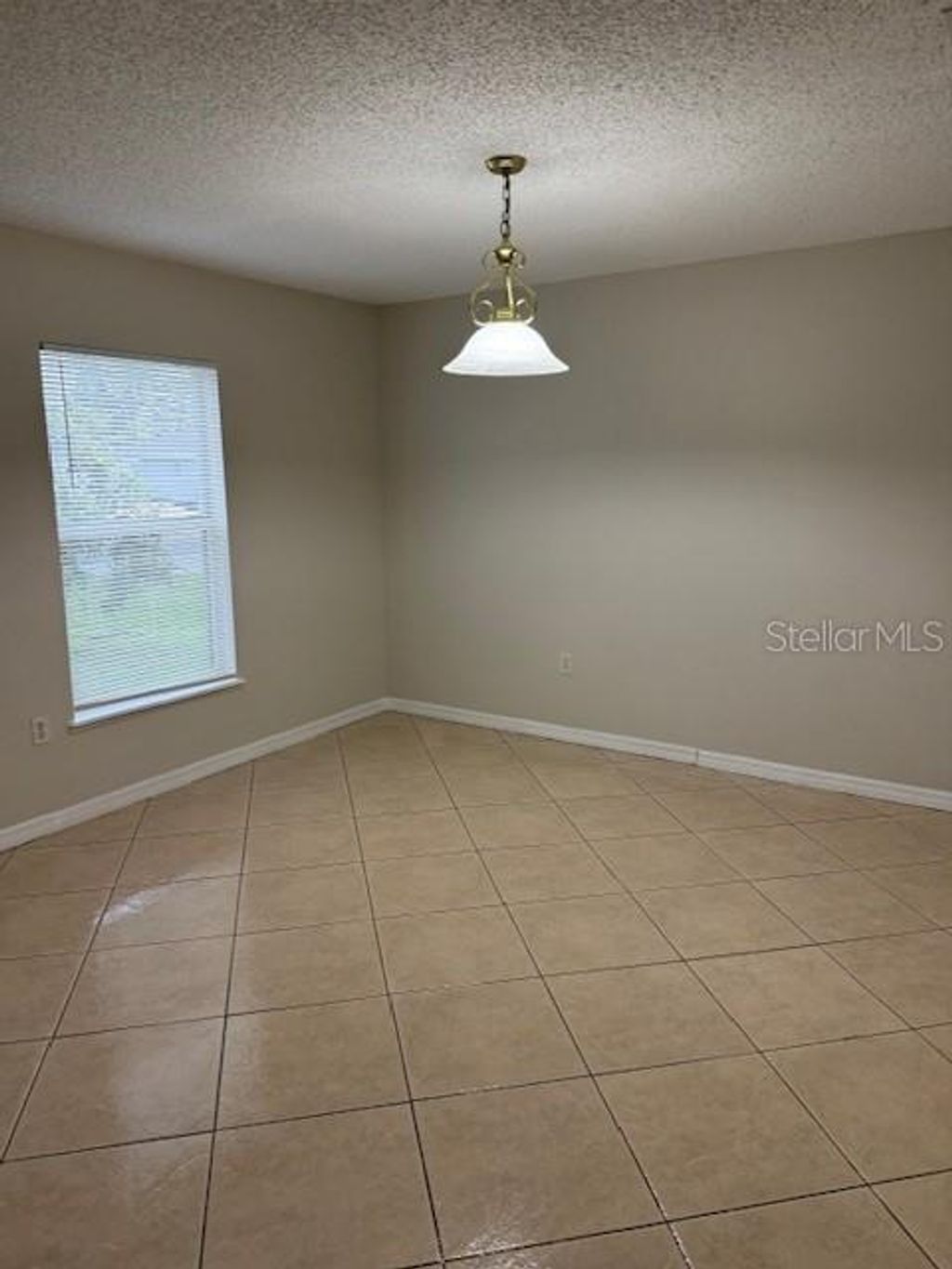 Photo of 744 Paris Drive, Kissimmee, FL 34759 (MLS # S5147923)