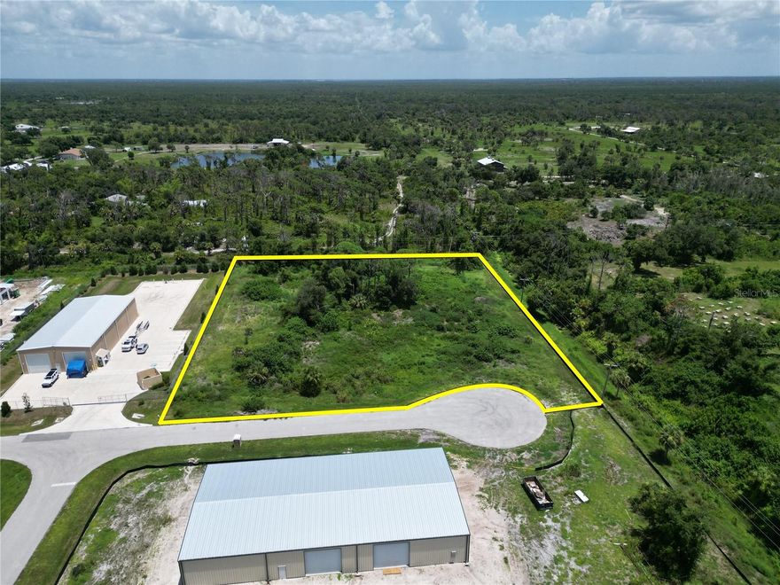 2-acre industrial development opportunity in Morris Industrial Park with a full set of building plans included and permitting achievable in approximately 30–45 days. Skip the 18–24 months of engineering, environmental studies, and design work and move straight toward construction. The approved site plan features two one-story buildings, each approximately 8,400 square feet. The north building is 50’ x 168’ and designed for seven RV or storage units, while the south building is 60’ x 140’ and designed for office and light manufacturing use. Environmental studies are available, and full engineering and site planning have already been completed. Located off River Road with direct access to US-41 and I-75 in a high-demand industrial corridor. This is a permit-ready project that saves significant time and money for investors or owner-users looking to fast-track development.