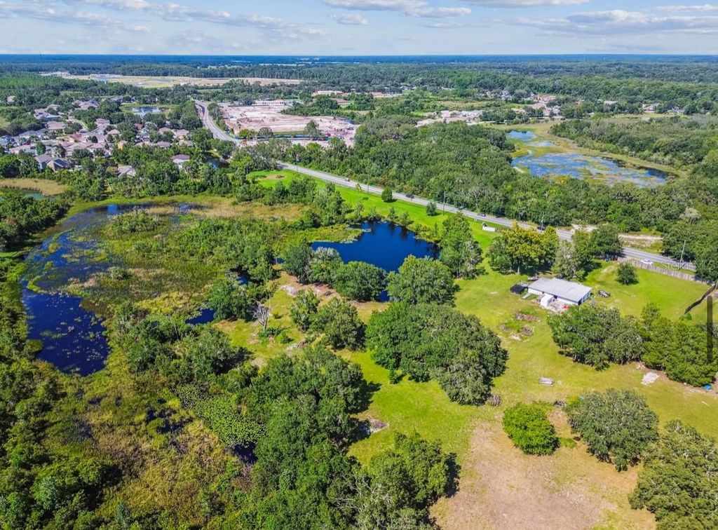 Photo of 12321 Shady Hills Road, Spring Hill, FL 34610 (MLS # TB8416011)