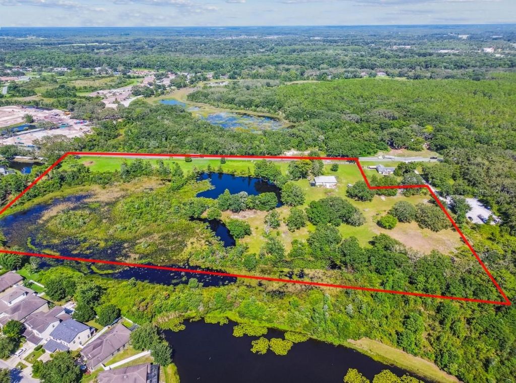 Photo of 12321 Shady Hills Road, Spring Hill, FL 34610 (MLS # TB8416011)