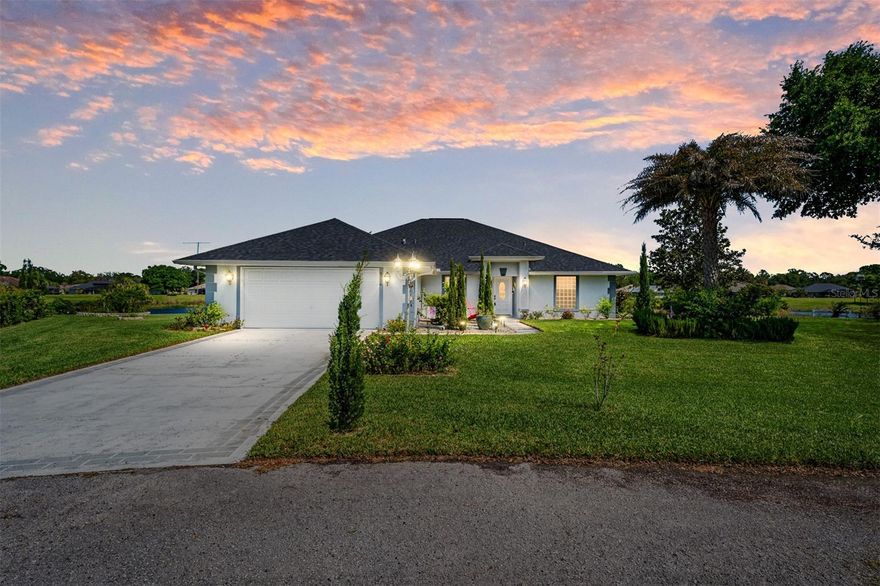 Waterfront Beauty in The Fairways – Over 2,500 Sq Ft

This beautifully updated 4 bedroom, 2 bathroom home offers peace, privacy, and breathtaking waterfront sunsets on over half an acre in the highly sought-after Fairways community of Wildwood. Step inside to a spacious open floor plan featuring a cozy gas fireplace and a gourmet kitchen complete with granite countertops and upgraded cabinetry. The expansive primary suite includes direct access to the lanai and a fully renovated en-suite bath with luxury finishes.

The enclosed, covered lanai provides stunning views of the serene water and offers plenty of space to relax or entertain. With over 2,500 square feet under roof, there's even room to add a pool. Recent upgrades include a new roof (2019), new AC (2018), and a new water heater (2023). Additional features include a Puronics water treatment system, updated closet systems, luxury waterproof laminate flooring in the bedrooms, and stylish, modern finishes throughout.

This home has been meticulously maintained with true pride of ownership and is move-in ready. Conveniently located just minutes from The Villages, shopping, dining, and golf, this is a rare opportunity to own a peaceful retreat with all the comforts of modern living. Schedule your private showing today—this one won’t last!