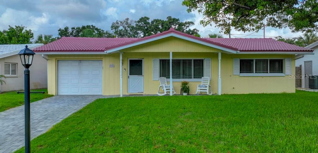 WELCOME HOME TO GREENBRIAR.. This home features 2 Bedroom/ 1.5 bathrooms, a 1 Car Garage, Ring door bell and newer Solar System along with a deep Well for irrigation, a sparking heated/cooled community Pool/Game rooms to entertain. Wow this home has it all.. The primary bedroom is spacious with ample closet space. The Living room is light and bright, a great place to entertain or enjoy family time. The remodeled chief's kitchen boasts new soft close modern shaker cabinets, and stainless appliances. Through the office/den/media room you have access to the beautifully landscaped large backyard. Great for the kiddos and your furry family to run and play. With a newer solar system system and lifetime tile roof to keep those costs at a minimum. Just a short walk to the Greenbriar Club is the community pool with showers/bathrooms. Stepping inside the center is the billiards and game room. Conveniently located near Countryside mall, downtown Dunedin with access to schools, shopping, Clearwater/Dunedin beaches and airports. Don’t let this home get away.