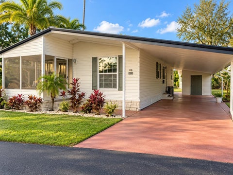 Photo of 5221 Poinciana Circle, New Port Richey, FL 34653 (MLS # O6447128)
