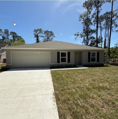 Photo of 37 Packard Lane, Palm Coast, FL 32164 (MLS # C7509196)