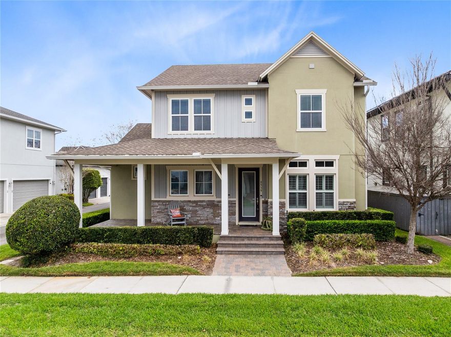 Set on a corner lot in the heart of Laureate Park, this David Weekley home offers 4 bedrooms, 3 full baths, 1 half bath, a dedicated office, a spacious loft, and an oversized rear entry 3 car garage across 3,270 square feet of thoughtfully designed living space. Built in 2015, the layout blends comfort, function, and timeless style with the primary suite on the first floor and generous gathering spaces throughout.

From the moment you arrive, the home makes a strong first impression with its welcoming covered front porch, attractive architectural details, and beautiful corner lot setting. Inside, rich wood flooring, crown molding, plantation shutters, and abundant natural light create a warm and polished feel. Just off the entry, the dedicated office offers a bright and refined space for working from home, reading, or quiet conversation, while the formal dining room provides an elegant setting for hosting holidays, dinner parties, and everyday gatherings.

At the center of the home, the open concept kitchen and living area feels especially impressive with soaring ceilings, tall windows, and seamless flow between each space. The kitchen is beautifully appointed with stone counters, a large island with bar seating, extensive cabinetry, built in oven and microwave, cooktop, designer vent hood, glass front display cabinets, and a walk in pantry. The adjacent dinette offers a casual everyday dining space, while the dramatic living room is filled with natural light and opens to the screened lanai for easy indoor outdoor living.

Privately tucked away on the first floor, the primary suite offers a spacious retreat with wood flooring, crown molding, and an easy connection to the covered outdoor area. The en suite bath features dual sinks, a soaking tub, a large walk in shower, and a generous walk in closet with exceptional storage.

Upstairs, the open to below design adds character and dimension, while the large loft creates the perfect second living area, media room, playroom, or flex space. A built in desk area adds even more versatility for homework, studying, or a secondary workspace. Three additional bedrooms and two full baths are thoughtfully positioned to give family and guests space and privacy. Practical features including a mud room, dedicated laundry room, extra storage, and an oversized garage add even more everyday convenience.

Outside, the screened lanai offers a comfortable place to relax or entertain with paver flooring and a private feel created by mature landscaping. The rear entry 3 car garage and corner lot placement add both curb appeal and functionality, making this home as practical as it is inviting.

Laureate Park isn’t just a neighborhood, it’s a vibrant lifestyle. Enjoy the Aquatic Center, resort style pools, LP Fit gym, and 44+ miles of trails. Located in prime Lake Nona, minutes from Medical City, the VA hospital, Nemours, dining, and shopping. Close to major highways, Orlando International Airport, and the USTA National Campus. Easy access to Orlando’s top theme parks and beautiful Florida beaches. This home blends space, style, and community in a sought after location. Experience elevated living, schedule your private tour today.