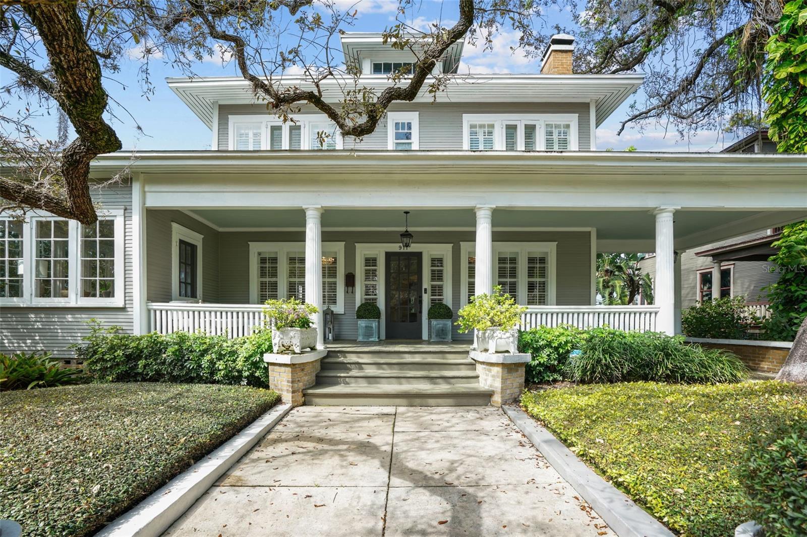 Perfectly positioned two blocks from Bayshore Boulevard and two blocks from Hyde Park Village awaits your new home. This stunning, well-maintained beauty offers the quintessential Hyde Park experience. Imagine watching the world go by or visiting with neighbors on your expansive front porch. Or relax in the sun-drenched Florida room accessible from the porch or living room. Cozy up by the gas fireplace with a great book or for intimate conversations. There are multiple areas to entertain too. The living room is divided into two sitting areas, the dining room can accommodate seating for 8-12 and the possibilities are endless on the back deck. The kitchen features an island, gas Dacor range, stainless steel appliances and marble counters. There is a sizable pantry and French doors leading to the back yard. There is also a private room and full bath, perfect for visitors. Upstairs, find a primary bedroom and walk in closet unseen in most Hyde Park homes. It is stately and spacious. And the primary bath, features marble floors and walls, a dual sink vanity and walk in shower. There are two secondary bedrooms with a Jack and Jill bath also featuring marble tile and floors. This home features all of the historic finishes you expect like solid wood floors, wonderful millwork, and high ceilings. But what makes this home exceptional is the work that has gone into keeping it updated throughout the years. From upgraded electrical, updated plumbing lines, new HVACs and duct work, and newer roof, 911 Dakota offers worry free living. Schedule your showing today!