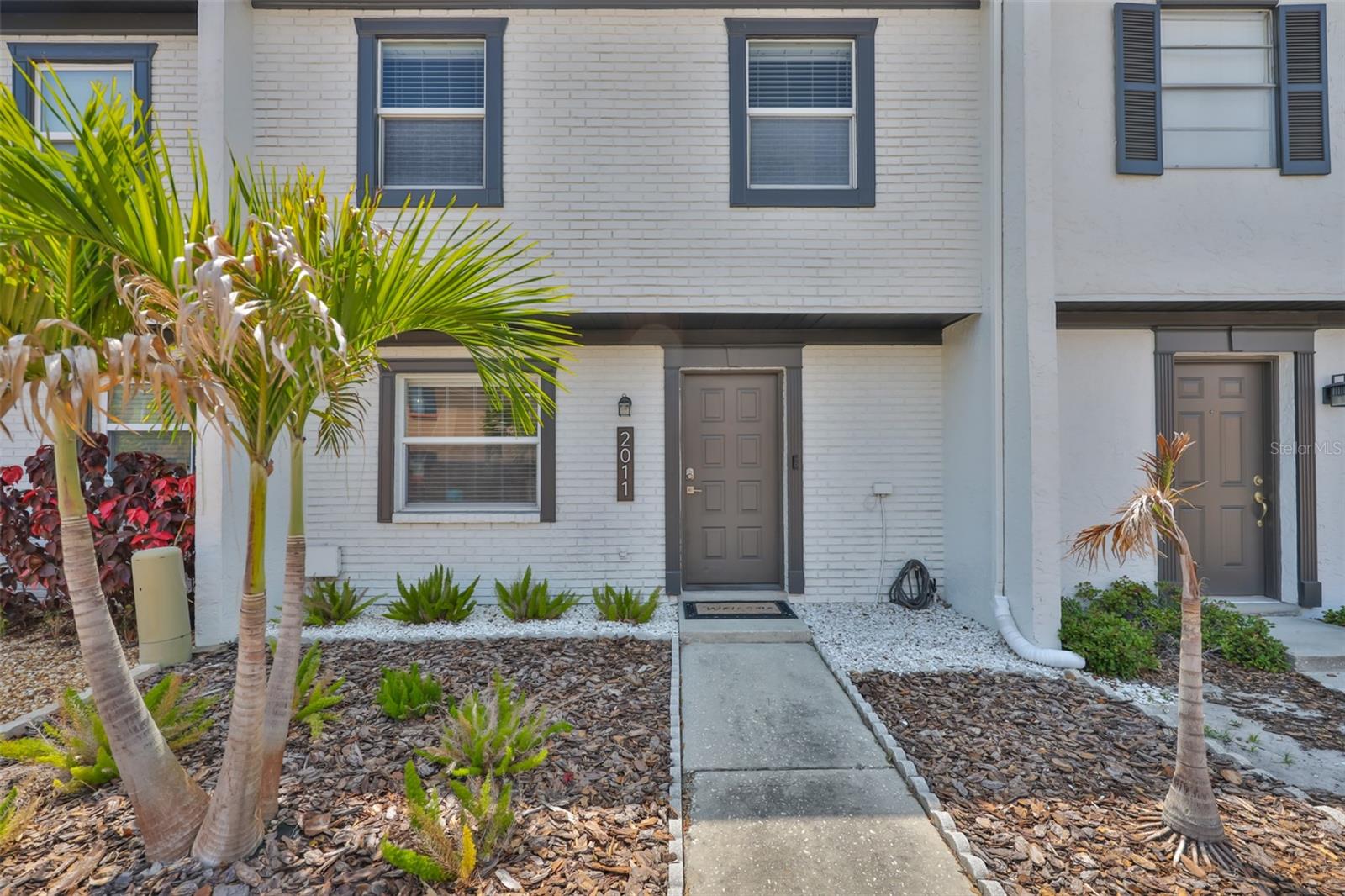 South Tampa Living at Its Best
Location really is everything—and this stylish townhome puts you right in the middle of it all. Tucked away on a quiet cul-de-sac in Bayshore Gardens, this rare find comes with 2.5 covered parking spots plus a private driveway (so you’ll never stress about parking again—and your friends won’t either).
Just three blocks from Bayshore Boulevard, minutes to Hyde Park Village, and zoned for Plant High School, this home delivers the perfect balance of convenience, lifestyle, and long-term value.
Step inside and you’re greeted by a bright, open-concept layout made for modern living. The spacious living and dining areas flow seamlessly, while the kitchen’s pass-through keeps entertaining easy and social.
Upstairs, you’ll find two oversized bedrooms, both with walk-in closets and hurricane-impact windows and sliders that cut down outside noise—ideal for working from home or recharging after a busy day.
Out back, a private fenced yard offers the perfect space for a morning coffee, weekend BBQ, or letting your pup run free. Plus, there’s an exterior storage closet for all your gear.
With a new roof (2022), new AC (2021), ultra-low HOA of just $125/month, and no flood insurance required, this home is as practical as it is stylish. Bayshore. Hyde Park. Plant District. Covered Parking. Low HOA. Private Yard. This one checks every box for the ultimate South Tampa lifestyle.