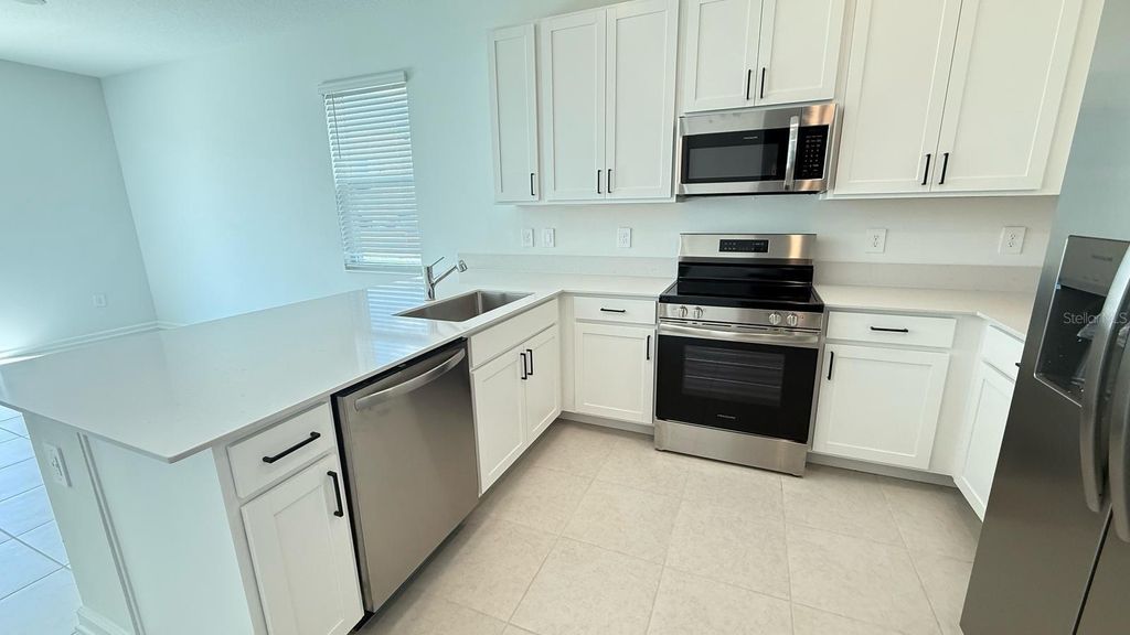 Photo of 3114 Laurent Loop, Davenport, FL 33837 (MLS # O6356590)