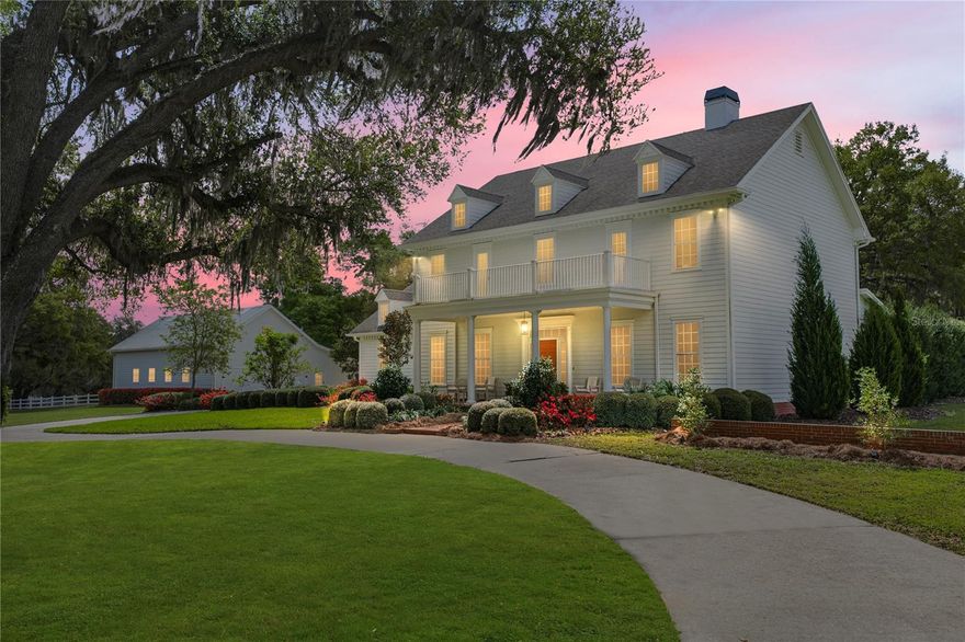 Refined Southern Elegance on 5 Private Acres. Experience timeless Southern charm and modern
luxury in this exceptional estate offering 3,608 heated square feet in the main residence and an
additional 1,000+ square feet guest retreat above the barn. Perfectly positioned on five
picturesque acres, this stunning property offers privacy, beauty, and endless possibilities for
equestrian living. From the moment you step into the grand foyer, the home showcases
impeccable craftsmanship with custom trim work, detailed moldings, rich hardwood floors, 9-
inch baseboards, and elegant 10-inch crown molding throughout the main level. The thoughtfully
designed floor plan balances sophistication and comfort, beginning with a formal parlor that
shares a fireplace with the inviting family room, creating a warm and elegant space ideal for
entertaining and cozy nights by the fire. A formal dining room sits just off the foyer, offering the
perfect setting for memorable dinners and celebrations. Throughout the home, abundant natural
light pours through expansive windows, highlighting the quality finishes and beautiful
architectural details. The heart of the home is the chef’s kitchen, featuring 42-inch maple
cabinetry, stone countertops, and an eat-in dinette, designed to blend functionality with timeless
style. French doors from the family room open to a screened porch surrounding the brick
accented outdoor living area and pool deck, creating a seamless transition between indoor
comfort and outdoor relaxation. Upstairs, four generous bedrooms utilize the newly renovated
bathrooms that add modern elegance while maintaining the home’s classic Southern character.
Beyond the home itself, the property unfolds into a truly remarkable setting. A charming cottage
garden filled with flowers, herbs, and vegetables creates a peaceful retreat, while a fenced area
with chicken coop adds to the property's country lifestyle appeal. The three-stall barn enhances
the estate’s versatility and includes beautifully finished guest quarters above, complete with an
entertaining space, three custom built-in beds, a full bathroom, and additional storage, perfect for
guests, extended family, or a private retreat. With five acres allowing horses, this extraordinary
property offers the opportunity to create a stunning equestrian estate while enjoying the elegance
of Southern living. A rare combination of luxury, privacy, craftsmanship, and lifestyle, this is
more than a home; it is a place to truly live.