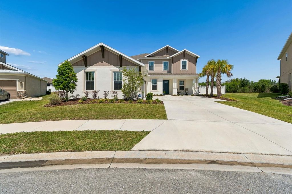 Photo of 6870 Talamore Drive, Wesley Chapel, FL 33545 (MLS # TB8502894)